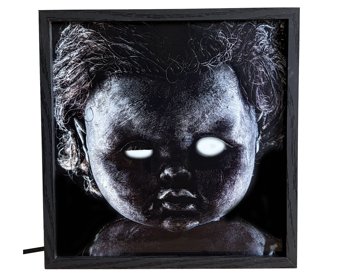 Glowing Eyed Creepy Doll