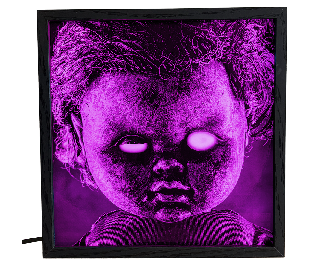 Glowing Eyed Creepy Doll