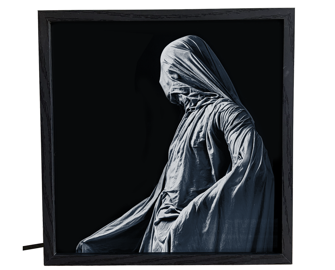 Ghostly Cloaked Figure