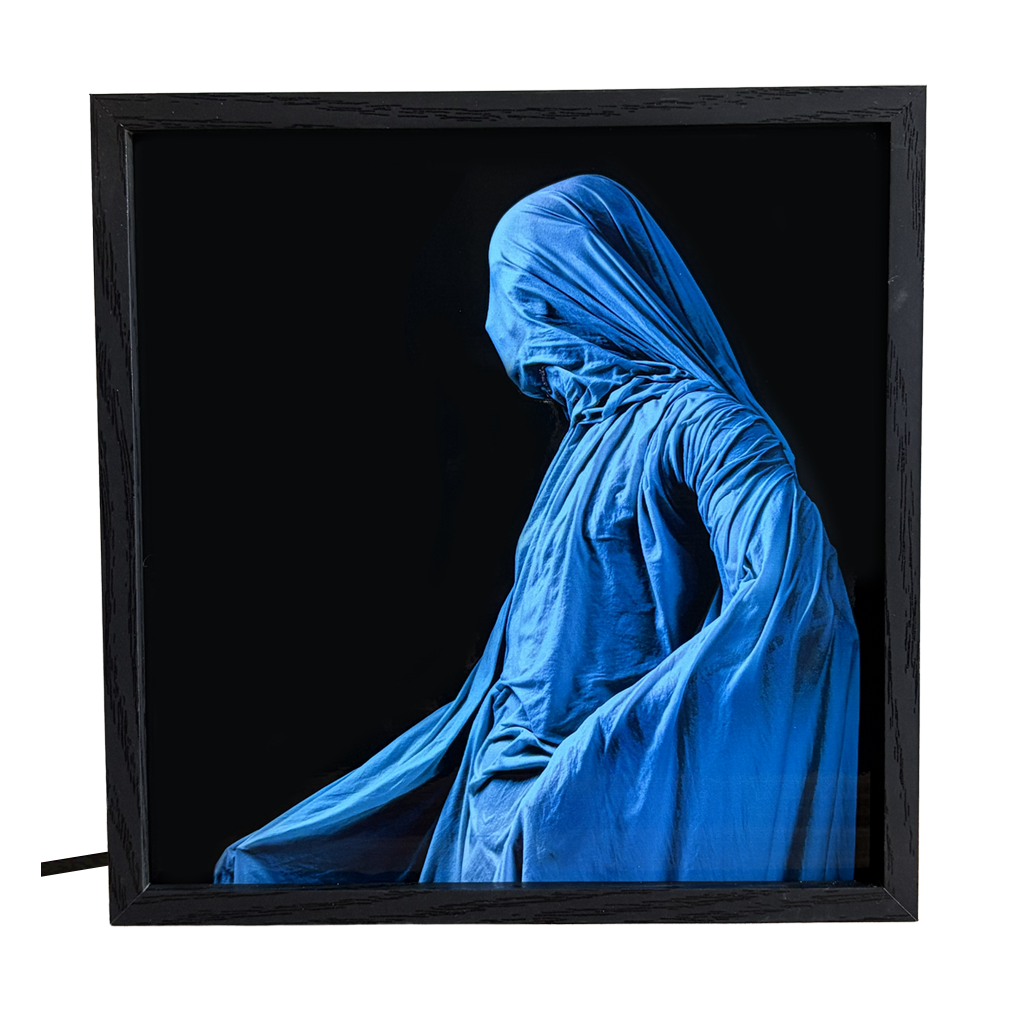 Ghostly Cloaked Figure